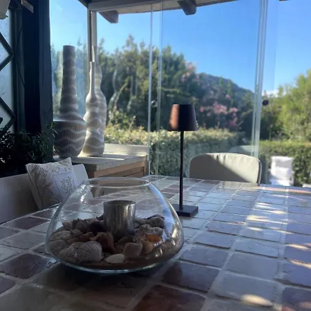 In Porto Cervo Surrounded By Greenery *